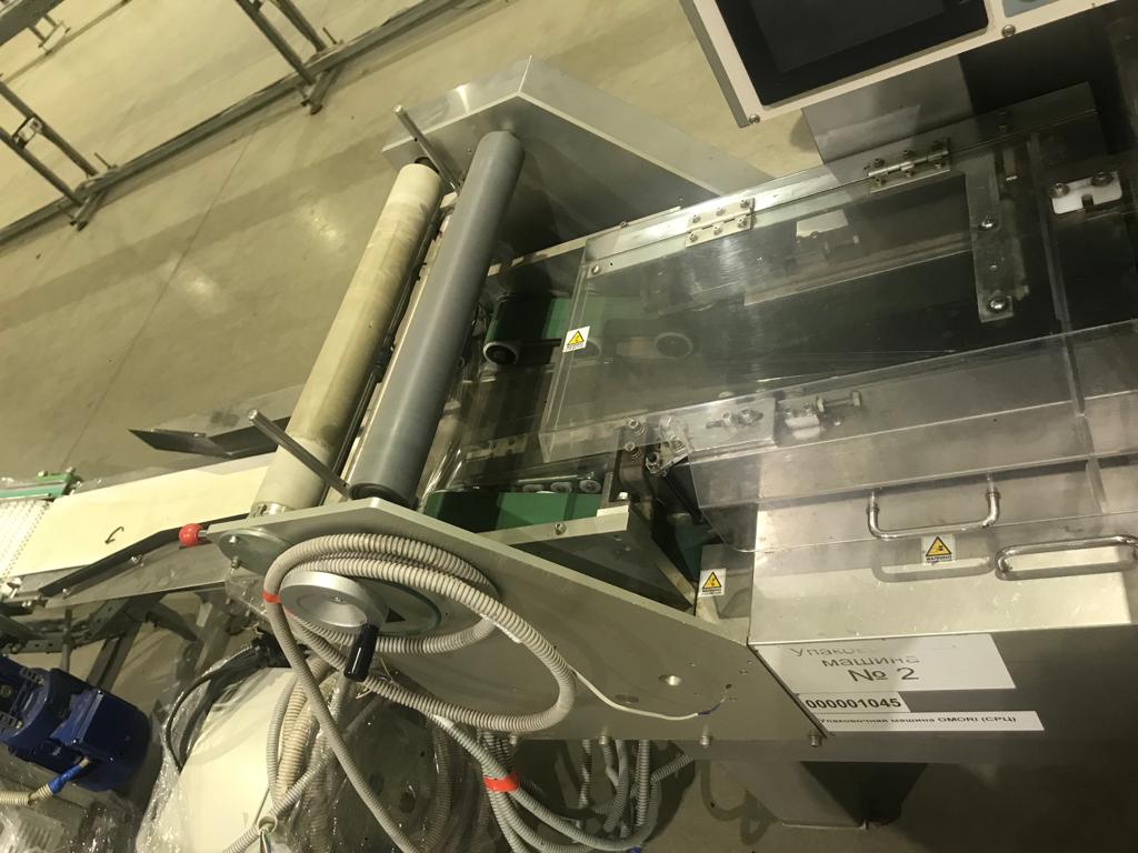 Упаковочный комплекс OMORI (Япония), Автомат OMORI серии STС-N транспортер OMORI, Автоматическая установка для нанесения этикеток COLLAMAT 25 м/мин.